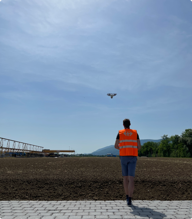 Swiss Federal Railways staff observing drone. 